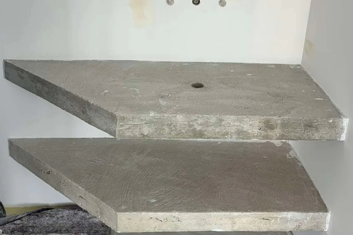 Before — corner vanity unit in a bathroom