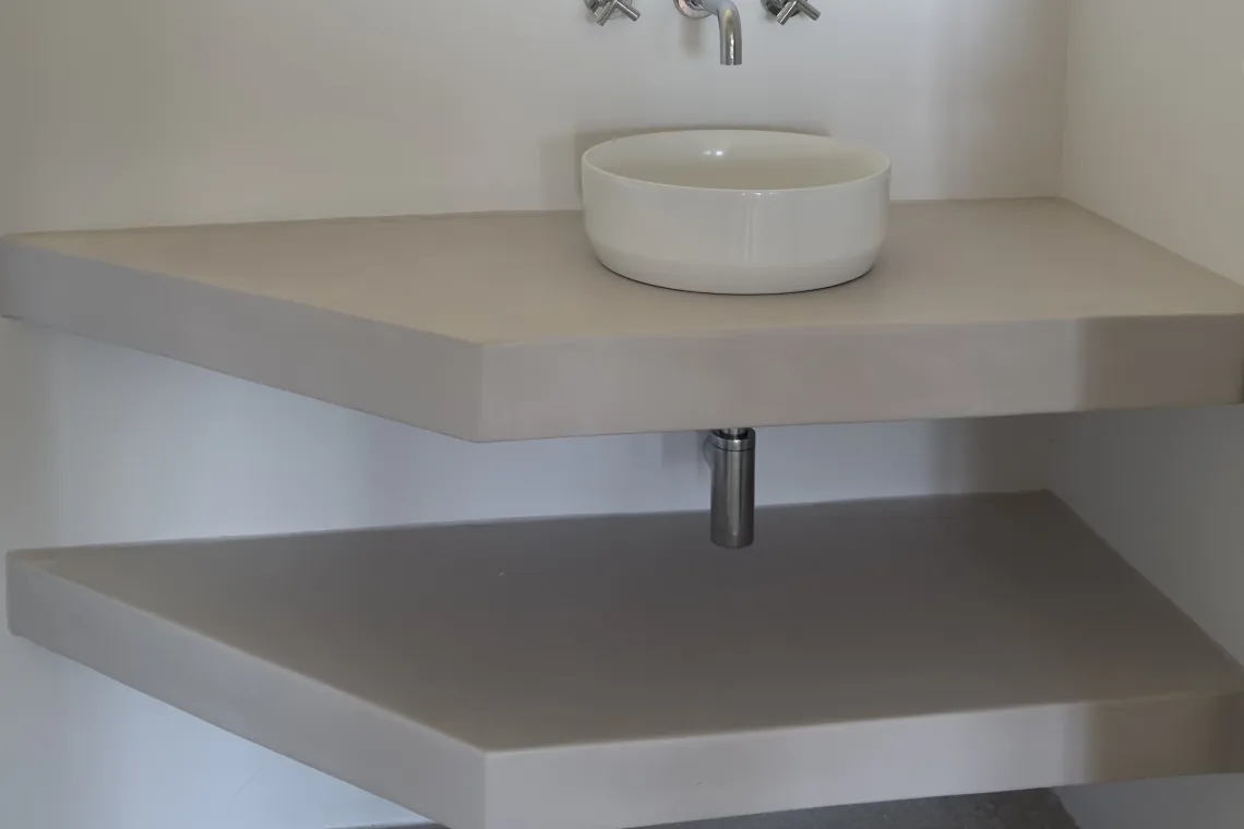After — corner vanity unit in a bathroom